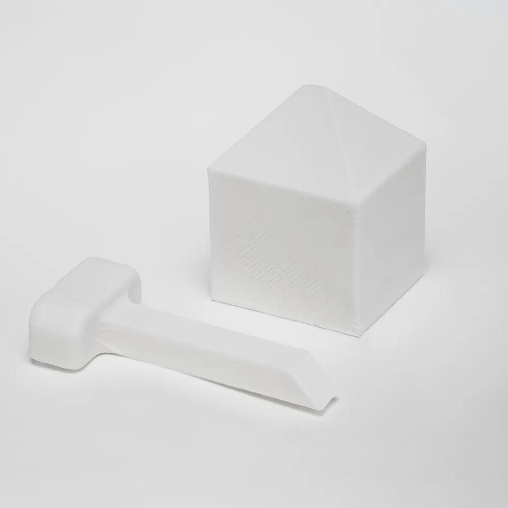 2 dele -Hjælper til Gummiapan Mini Hus.webp